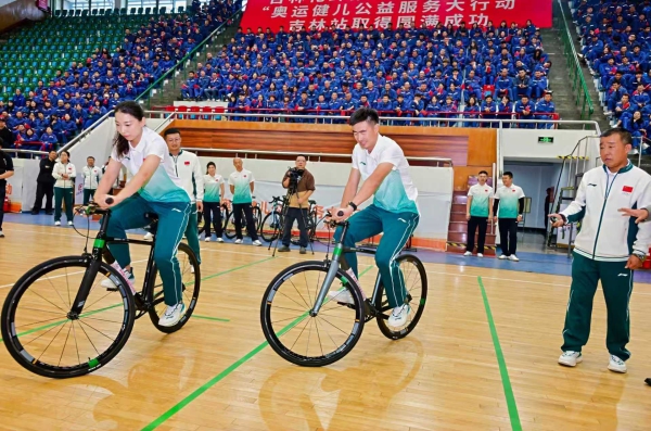 Athletes interacting with employees during a sports event